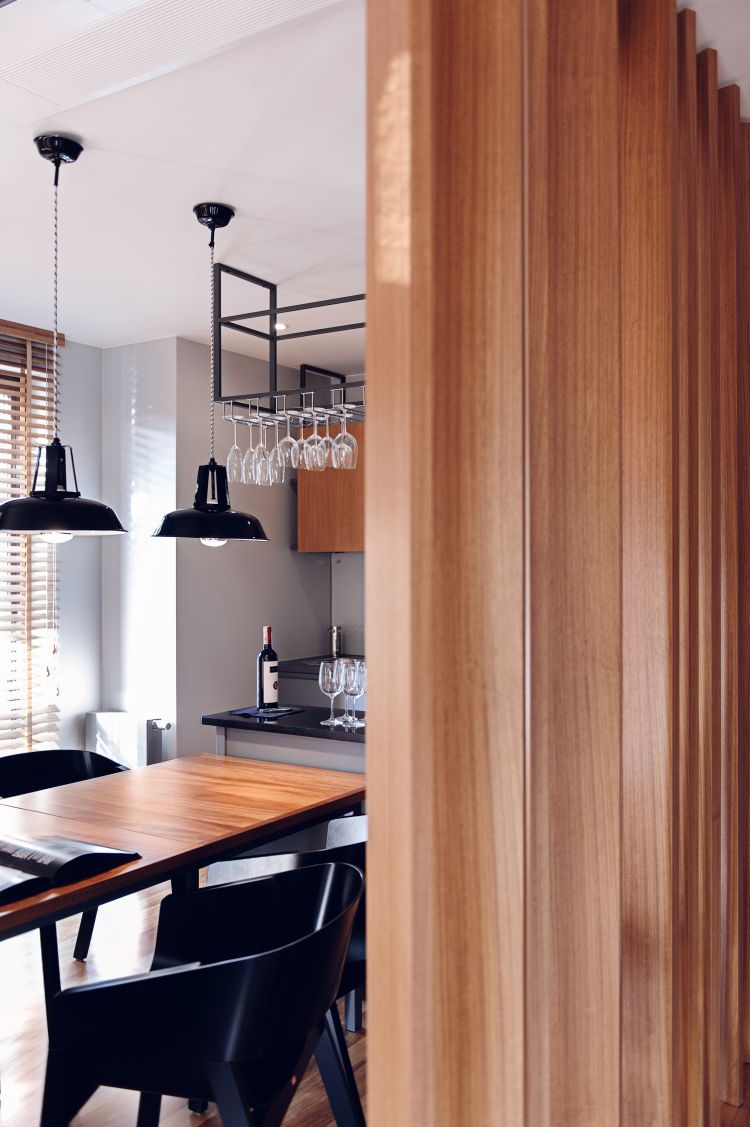 Elegant dining setting with a black Merano armchair