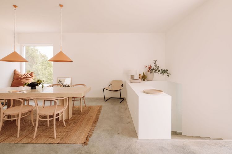 Neutral themed dining room with wooden dining chair