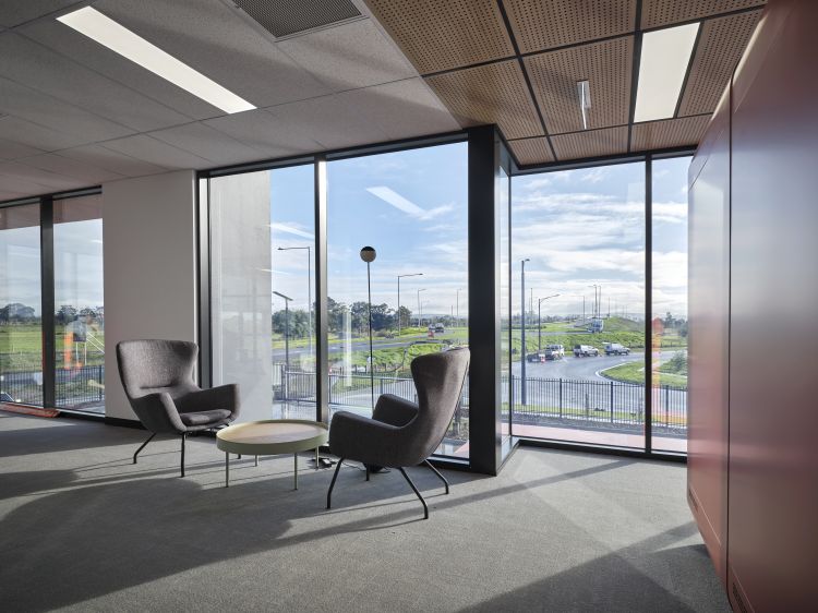 An office waiting room overlooking the highway