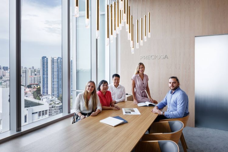 The staff in a meeting room