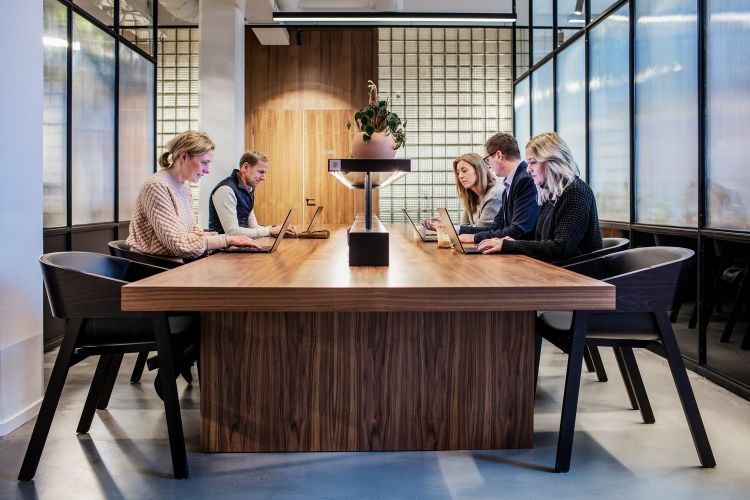 The staff in a meeting room