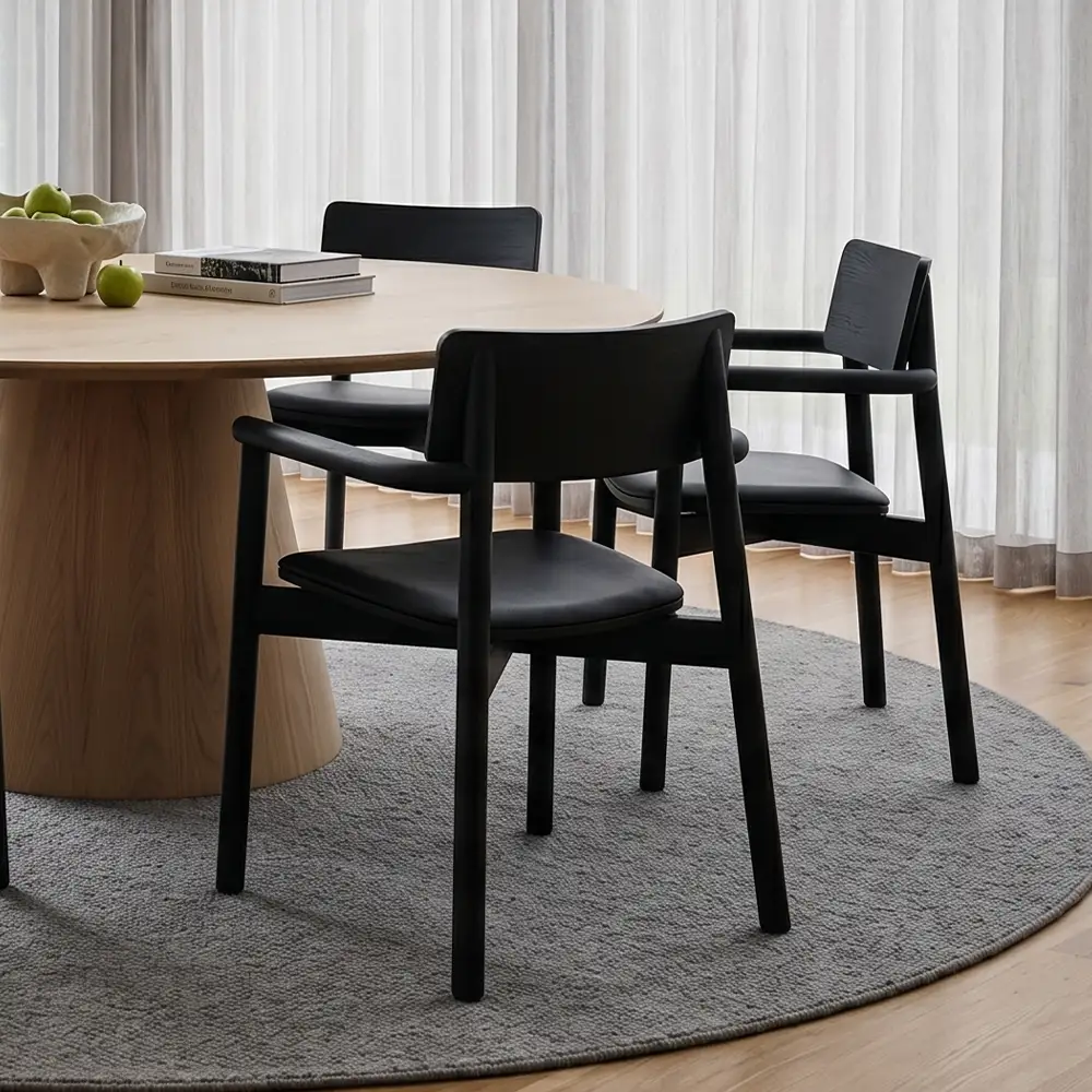 Black Andi Armchairs in a house