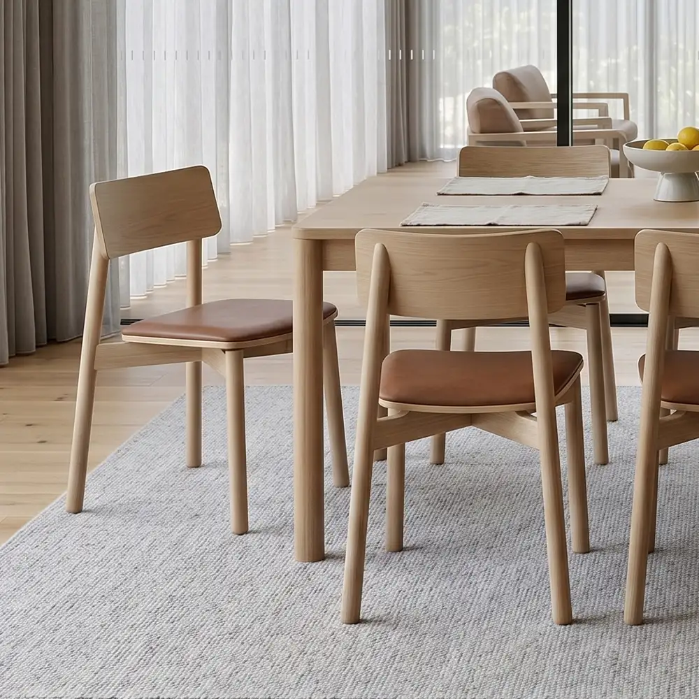 Tan leather natural dining chairs