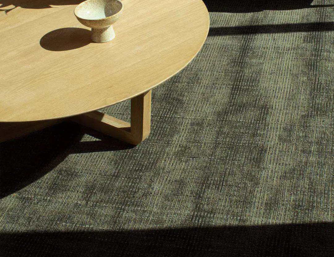 Garcia Wool Rug in Olive green with timber coffee table