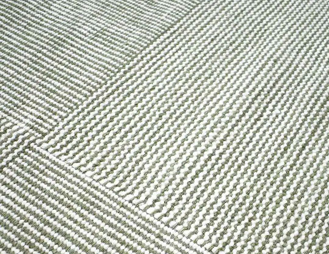 Braid Box wool rug in sage green with white pinstripe contrast stripes