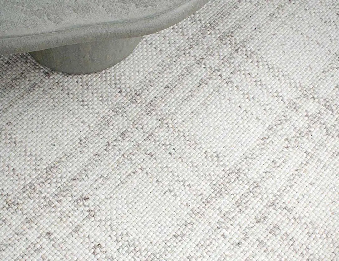 Dillon Fringe Wool Rug in Ivory with soft checks and layered neutrals